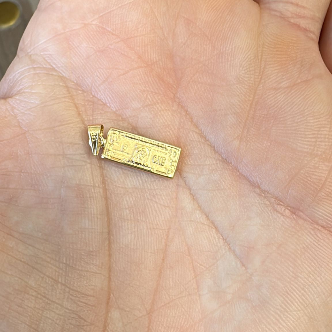 18k dollar pendant